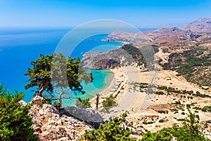 Sea skyview landscape photo Tsambika bay on Rhodes island, Dodecanese, Greece. Panorama with nice sand beach and clear blue water