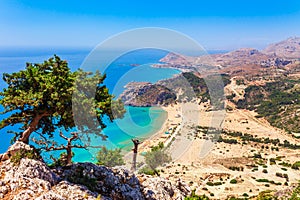 Sea skyview landscape photo Tsambika bay on Rhodes island, Dodecanese, Greece. Panorama with nice sand beach and clear blue water