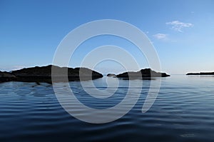 The sea with small islands in Norge photo