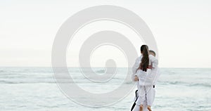 Sea, sports or kid with father to play martial arts, fighting or fun games together for karate or fitness. Swing, dad or