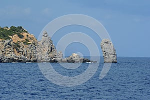 Sea stack off coast of Campese, Giglio Island Italy photo