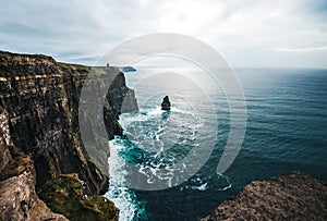 A sea stack stands out from the Irish Cliffs of Moher