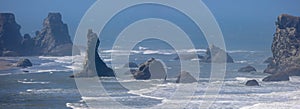 Sea stacks along the Pacific coast at Bandon, Oregon under hazy humid atmosphere