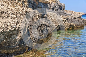 Sea stone natural cliff with water shore beauty seascape