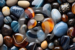 Sea stones of different colors and shapes. rock on the beach. ?olored pebbles on the seashore.