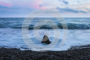 Sea stones with dramatic sky