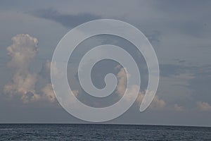 Blue Sky and The Serenity by the Beach