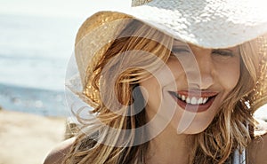 Sea and sun, summer has begun. an attractive young woman enjoying her day on the beach.