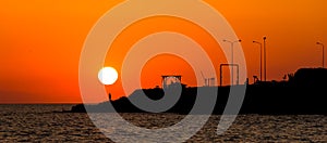 Sea sunset silhouette of Neos Marmaras cast in Greece photo
