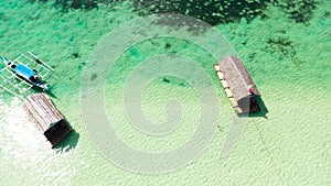 Sea surface with bamboo cottages. Summer and travel vacation concept.