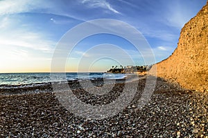 sea surface and sunny summer rocky coastline