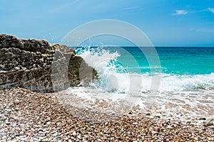 Sea swash. Waves breaking on the rocks. photo