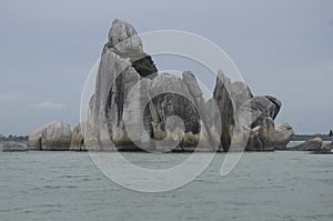 sea and tall rock on belitung city