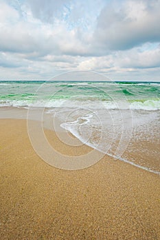 Sea tide on a cloudy evening