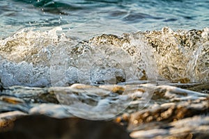 Sea tide , waves hitting rocks