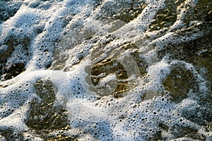 Sea tide , waves hitting rocks