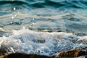 Sea tide , waves hitting rocks