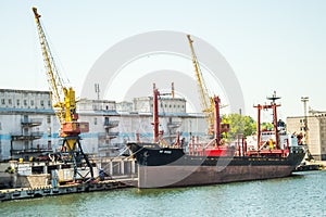 Sea Trade Port. Container terminal. Cranes, cargo ships. Horizon