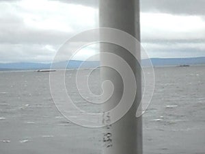 Sea of Troubles with the ship`s deck. Waves in cloudy weather