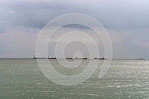 Sea vessels on the roadstead in Novorossiysk Bay waiting for unloading