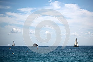 Sea vessels on seascape background