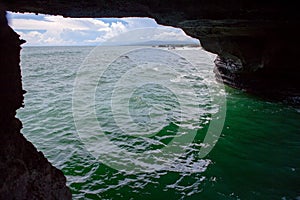 Sea view through cove in rocks