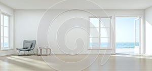 Sea view living room with empty wall in modern beach house, Luxury white interior of summer home