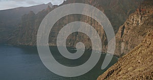 Sea view from Los Gigantes beach, Cliffs of the Giants at sunset, Tenerife, Canary islands, Spain.