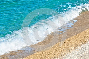 Sea view pebble beach and turquoise water tranquil scene