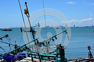 Sea view and small boat At the fishing pier