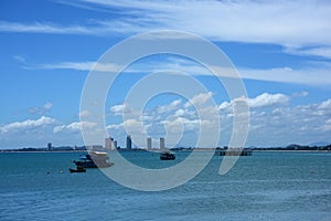 Sea view and small boat At the fishing pier