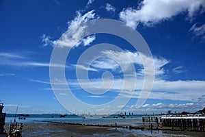 Sea view and small boat At the fishing pier