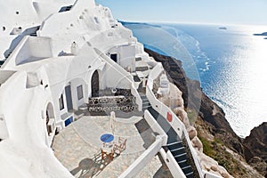 The sea view terrace with table and chairs at luxury hotel on Santorini island, Greece