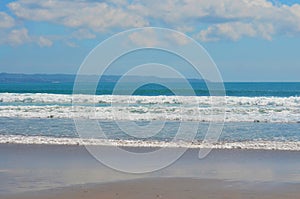 Sea view from tropical beach with sunny sky. Summer paradise beach of Bali island.