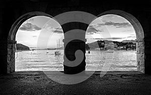 Sea view through two arches of the gallery. Cavtat, Dubrovnik, Croatia