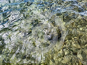 Sea water, reflection on water. Abstract sea background.