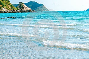 Sea wave breaking with rocky beach, Holiday and relax time concept, selective focus