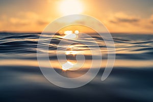 Sea wave close up, low angle view, sunrsie shot