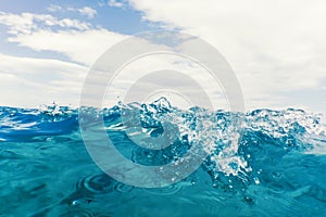 Sea wave close up, low angle view water background