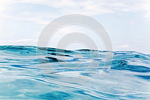 Sea wave close up, low angle view water background