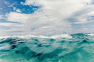 Sea wave close up, low angle view water background