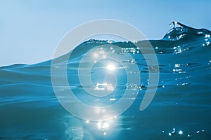 Sea wave close up, low angle view water background