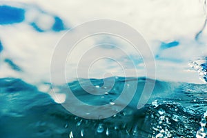 Sea wave close up, low angle view water background