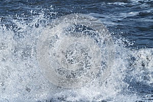 Sea wave off the coast. Splashing water.  sea foam