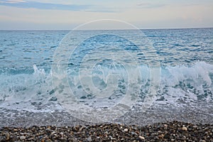 Sea wave on pebbles