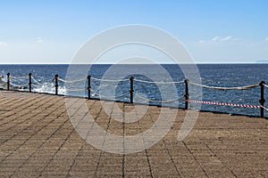 Sea wave slamming on the embankment