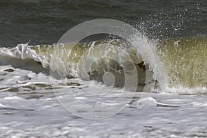 Sea waves at Ban Krut Beach in monsoon season