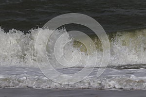 Sea waves at Ban Krut Beach in monsoon season