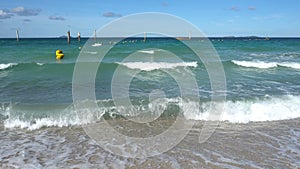 Sea waves on the beach, rocks and white sand, Koh Larn, Chonburi