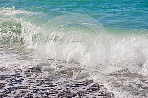 Sea waves on the beach. Selective focus. Summer nature background